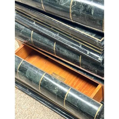 Sale Photo Thumbnail #263: 1970's Maitland Smith Tessellated Marble Book Box Side Table
18.25" x 16.5" x 18.75"
In great condition with minor scratches all over consistent with marble...nothing major.