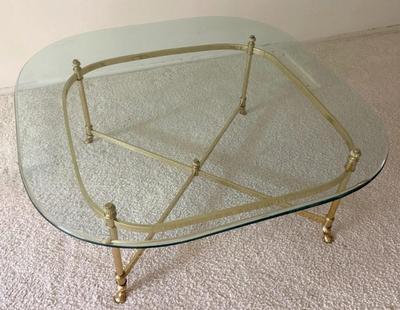 Sale Photo Thumbnail #267: Vintage Hollywood Regency La Barge Style Brass Coffee Table w Glass Top
“In good condition with minor marks on the brass. Glass could use a good cleaning
40" x 40" glass top
27" x 27" x 15" without glass top