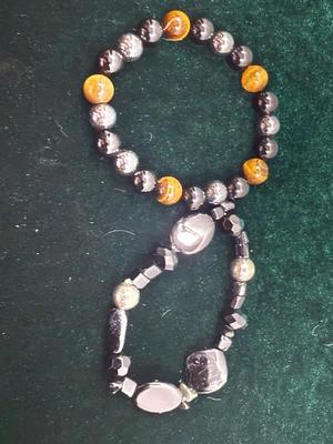 Two black and silver beaded bracelets