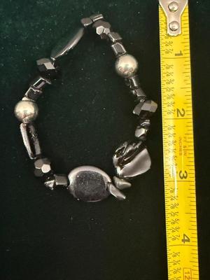 Two black and silver beaded bracelets