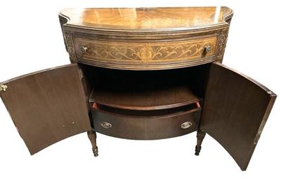 Sale Photo Thumbnail #384: Antique French Louis XV Demilune Commode Chest Cabinet Table w/Key

Condition Notes: In great antique condition with some scratch marks and one leg has a small crack on top and chip in wood. Slight crackling of the wood on the top of the cabinet where the