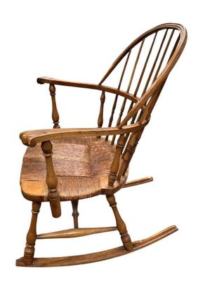 Sale Photo Thumbnail #395: Vintage Barnard & Simonds Co Wood Windsor Back Rocking Chair
“In great, sturdy condition with scuff marks allover consistent with age and use. Some dust.”
Approximate Size 22" x 27" (including rocking leg) x 37"
Seat 21" x 18"
Back Height 23.25"
Arm H