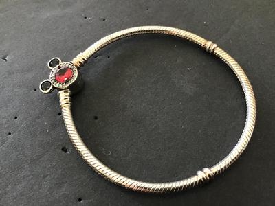 silver Bracelet with Mickey Pendant.
