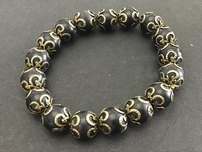 Black Stone Gold Accents Bracelet