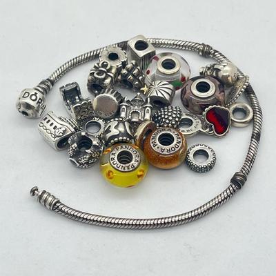 LOT 58: Sterling Silver 8" Pandora Bracelet with Beads/Charms/Hardware - 81 GTW