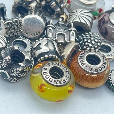 LOT 58: Sterling Silver 8" Pandora Bracelet with Beads/Charms/Hardware - 81 GTW