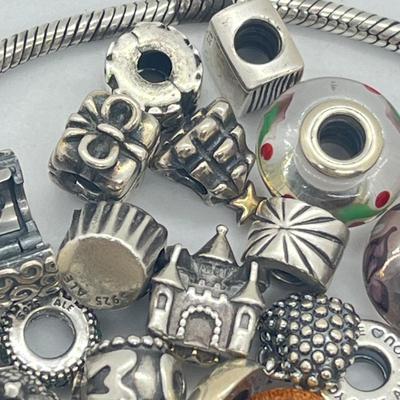 LOT 58: Sterling Silver 8" Pandora Bracelet with Beads/Charms/Hardware - 81 GTW