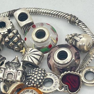 LOT 58: Sterling Silver 8" Pandora Bracelet with Beads/Charms/Hardware - 81 GTW