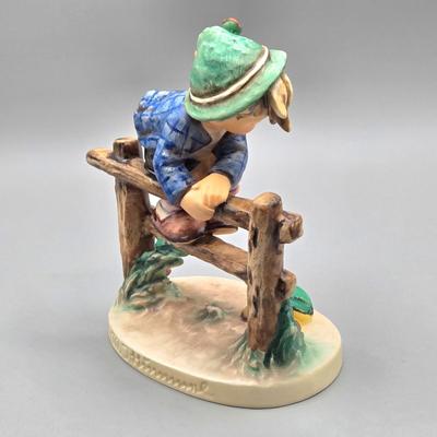 LOT 85: Hummel Goebel Retreat to Safety and She Loves Me / Not Figurines