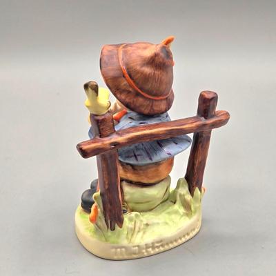 LOT 85: Hummel Goebel Retreat to Safety and She Loves Me / Not Figurines