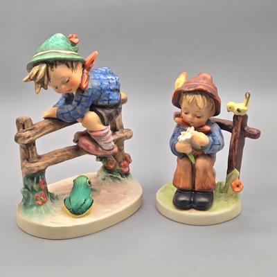 LOT 85: Hummel Goebel Retreat to Safety and She Loves Me / Not Figurines
