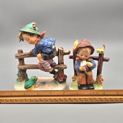 LOT 85: Hummel Goebel Retreat to Safety and She Loves Me / Not Figurines