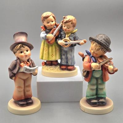 LOT 89: Street Singer, Happy Days, and Little Fiddler Hummels