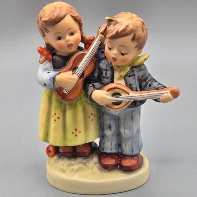 LOT 89: Street Singer, Happy Days, and Little Fiddler Hummels