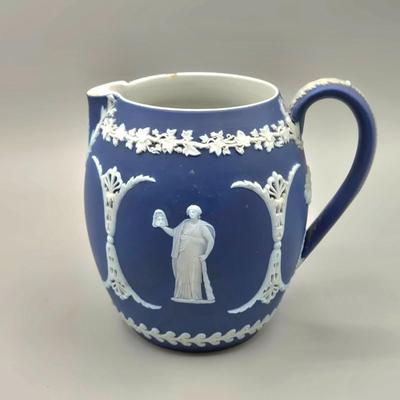 LOT 124: Wedgwood Blue Jasperware Cup and Saucer, 2 Small Pitchers, and More