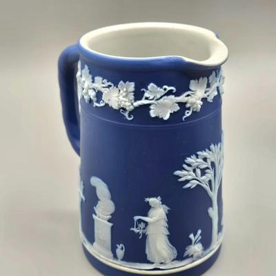 LOT 124: Wedgwood Blue Jasperware Cup and Saucer, 2 Small Pitchers, and More