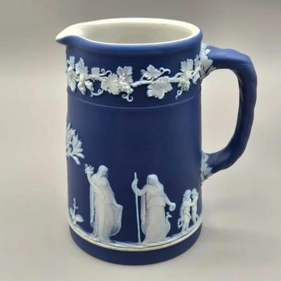 LOT 124: Wedgwood Blue Jasperware Cup and Saucer, 2 Small Pitchers, and More