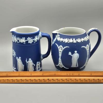 LOT 124: Wedgwood Blue Jasperware Cup and Saucer, 2 Small Pitchers, and More