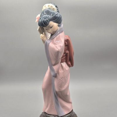 LOT 128: Lladro Timid Japanese Geisha Girl with Fan Figurine with Original Box