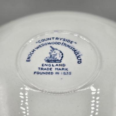 LOT 131: Enoch Wedgwood Tunstall Countryside Pieces Including 12 Cups, 17 Saucers, Creamer, and Sugar/ Storage Cases Included