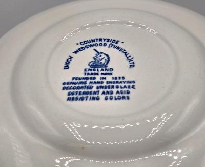 LOT 131: Enoch Wedgwood Tunstall Countryside Pieces Including 12 Cups, 17 Saucers, Creamer, and Sugar/ Storage Cases Included