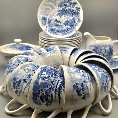 LOT 131: Enoch Wedgwood Tunstall Countryside Pieces Including 12 Cups, 17 Saucers, Creamer, and Sugar/ Storage Cases Included