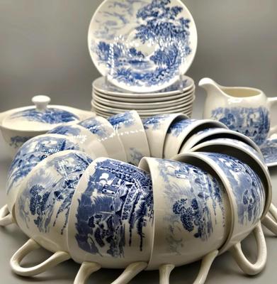 LOT 131: Enoch Wedgwood Tunstall Countryside Pieces Including 12 Cups, 17 Saucers, Creamer, and Sugar/ Storage Cases Included