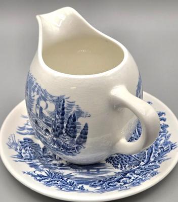 LOT 131: Enoch Wedgwood Tunstall Countryside Pieces Including 12 Cups, 17 Saucers, Creamer, and Sugar/ Storage Cases Included