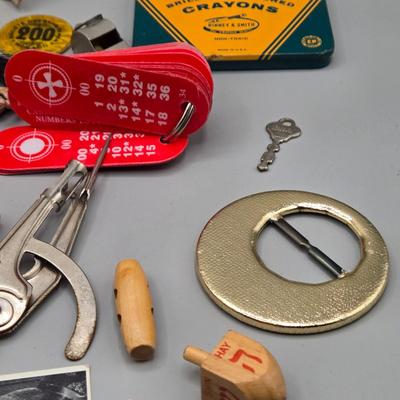 LOT 139: Primitive Wooden Box Filled with Treasures Such as Bucking Bronco and Cowboy Brass Zippo Lighter, Hixon Lumber Co. Tape Measure,...