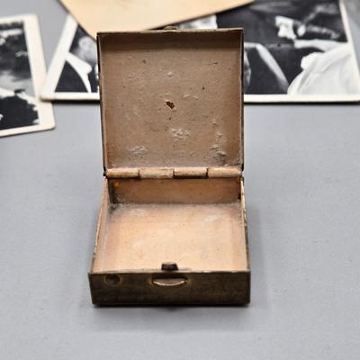 LOT 139: Primitive Wooden Box Filled with Treasures Such as Bucking Bronco and Cowboy Brass Zippo Lighter, Hixon Lumber Co. Tape Measure,...