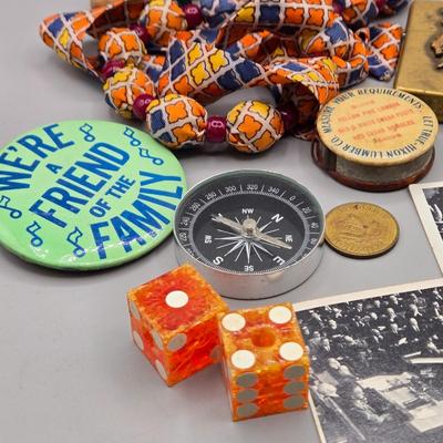 LOT 139: Primitive Wooden Box Filled with Treasures Such as Bucking Bronco and Cowboy Brass Zippo Lighter, Hixon Lumber Co. Tape Measure,...