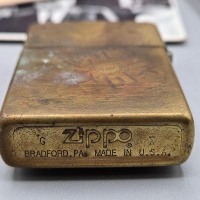 LOT 139: Primitive Wooden Box Filled with Treasures Such as Bucking Bronco and Cowboy Brass Zippo Lighter, Hixon Lumber Co. Tape Measure,...