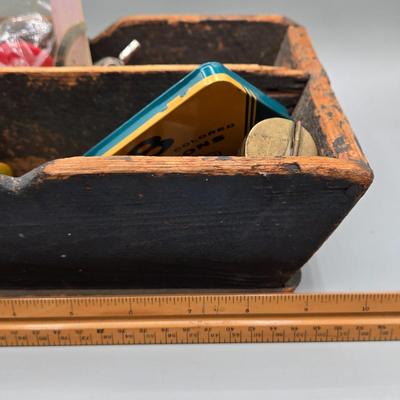 LOT 139: Primitive Wooden Box Filled with Treasures Such as Bucking Bronco and Cowboy Brass Zippo Lighter, Hixon Lumber Co. Tape Measure,...