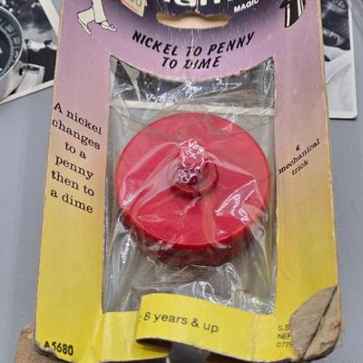 LOT 139: Primitive Wooden Box Filled with Treasures Such as Bucking Bronco and Cowboy Brass Zippo Lighter, Hixon Lumber Co. Tape Measure,...