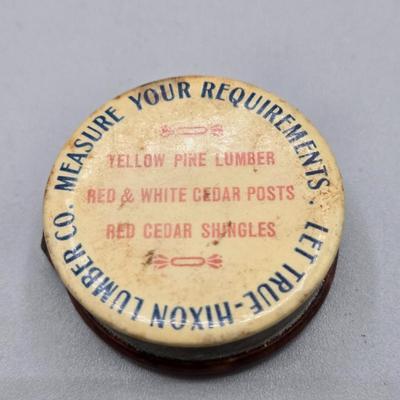 LOT 139: Primitive Wooden Box Filled with Treasures Such as Bucking Bronco and Cowboy Brass Zippo Lighter, Hixon Lumber Co. Tape Measure,...