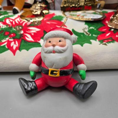 LOT 140: All Things Christmas, Including Glass Jar Filled with 1970s Wooden Christmas Ornaments, Vintage Santa Candle, 56x52 Tablecloth,...