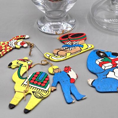 LOT 140: All Things Christmas, Including Glass Jar Filled with 1970s Wooden Christmas Ornaments, Vintage Santa Candle, 56x52 Tablecloth,...