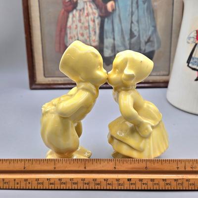 LOT 142: 5 Folk Art Rooster Napkins, 2 Crocheted Pot Holders, Ceramic Kissing Dutch Figurines, Vintage Figgjo Flint Norway Pitcher, and More