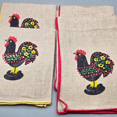LOT 142: 5 Folk Art Rooster Napkins, 2 Crocheted Pot Holders, Ceramic Kissing Dutch Figurines, Vintage Figgjo Flint Norway Pitcher, and More