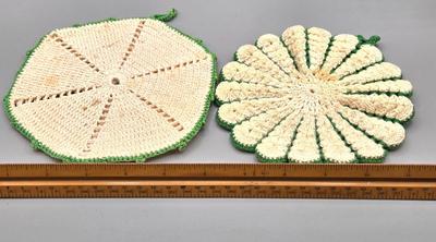 LOT 142: 5 Folk Art Rooster Napkins, 2 Crocheted Pot Holders, Ceramic Kissing Dutch Figurines, Vintage Figgjo Flint Norway Pitcher, and More