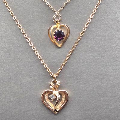 LOT 152J: Gold-tone Necklaces with Heart Charms and More