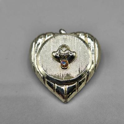 LOT 152J: Gold-tone Necklaces with Heart Charms and More