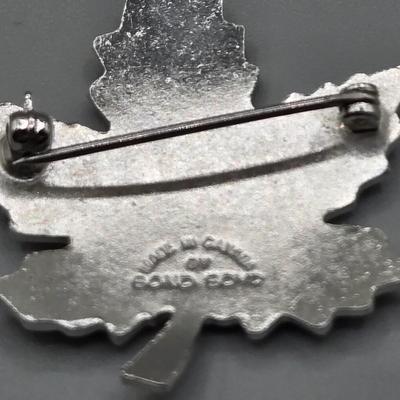 LOT 153J: Variety of Vintage Clip and Pierced Earrings and Pins Including Fall Leaves, Shamrocks, Holly, Bugs Bunny Santa, and More