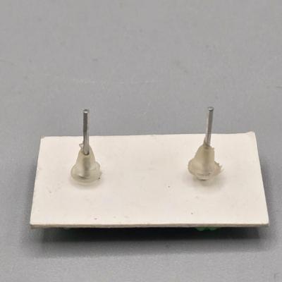 LOT 153J: Variety of Vintage Clip and Pierced Earrings and Pins Including Fall Leaves, Shamrocks, Holly, Bugs Bunny Santa, and More