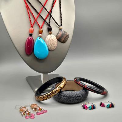 LOT 154J: Polished Stone Necklaces, Bangle Bracelets, and 2 Pairs of Pierced Earrings