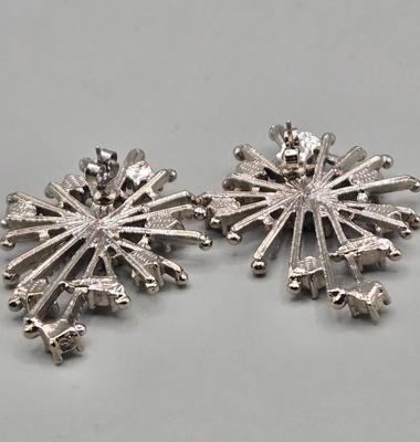 LOT 155J: Vintage Avon Snowflake Rhinestone Earrings, Elgin Starlite Silver Tone 17 Jewels Watch, and Silver-tone Bracelet