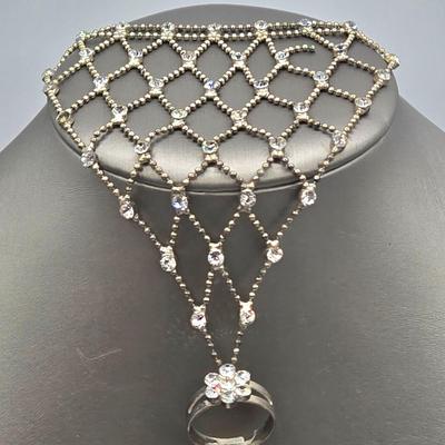 LOT 173J: Silver-tone Jewelry Including Rhinestone Turtle Clamper Bracelet, Bib Necklace, Multiple Bangle and Cuff Bracelets, and More