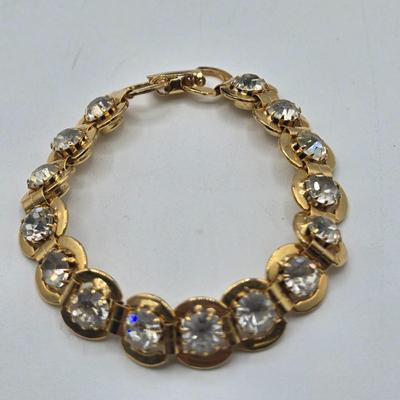 LOT 174J: Variety of Gold-tone Stretch and Clasp Bracelets