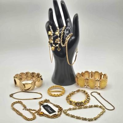 LOT 174J: Variety of Gold-tone Stretch and Clasp Bracelets