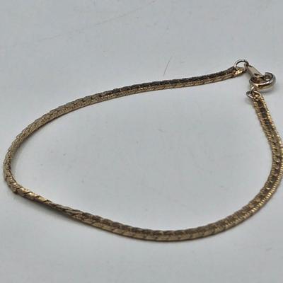 LOT 174J: Variety of Gold-tone Stretch and Clasp Bracelets